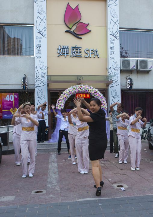 Spa Team Making Gymnastic In The Street, Beijing, China