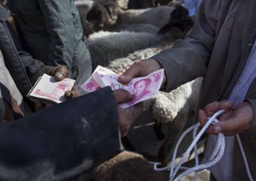 Uyghur Men Buying Sheep In Serik Buya Market, Yarkand, Xinjiang Uyghur Autonomous Region, China