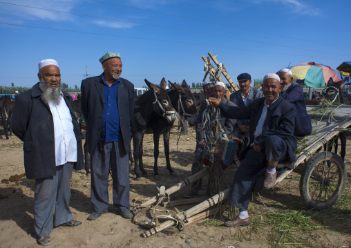 Uyghur Men In Serik Buya Market, Yarkand, Xinjiang Uyghur Autonomous Region, China