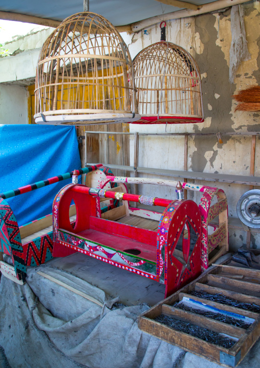 Bird cages and craddles for babies in the market, Badakhshan province, Ishkashim, Afghanistan