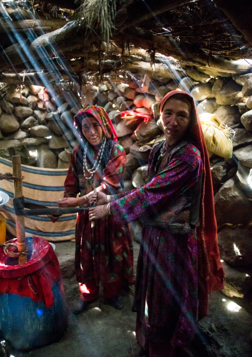 Wakhi nomad women making butter in the pamir mountains, Big pamir, Wakhan, Afghanistan
