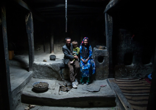 Afghan family inside their traditional pamiri house, Badakhshan province, Qazi deh, Afghanistan