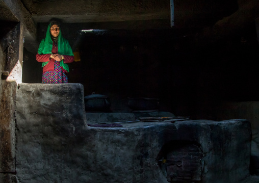 Afghan woman inside her traditional pamiri house, Badakhshan province, Zebak, Afghanistan