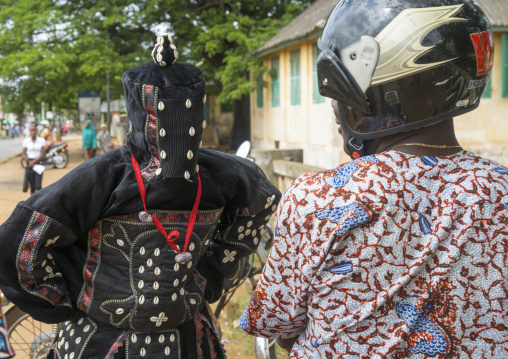 Benin, West Africa, Porto-Novo, egoun egoun spirit of the deads asks money to a man in exchange of blessings