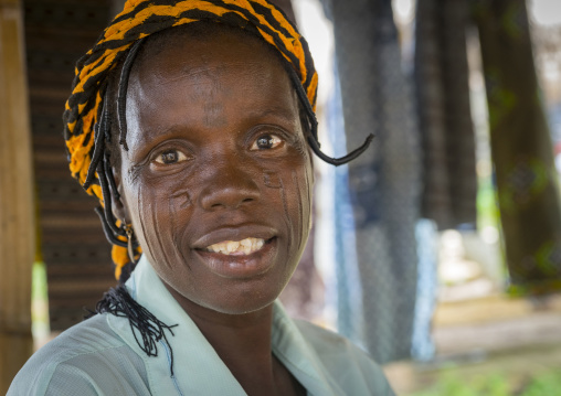Benin, West Africa, Onigbolo Isaba, holi tribe woman covered with traditional facial tattoos and scars