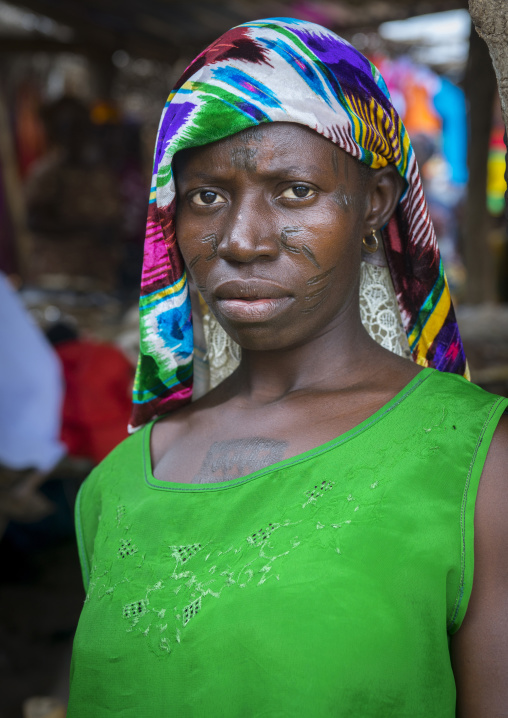 Benin, West Africa, Onigbolo Isaba, holi tribe woman covered with traditional facial tattoos and scars