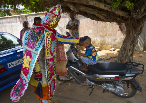Benin, West Africa, Porto-Novo, egoun egoun spirit of the deads asks money to people in exchange of blessings