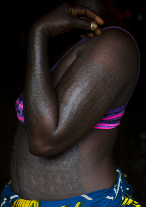 Benin, West Africa, Onigbolo Isaba, holi tribe woman covered with traditional tattoos and scars