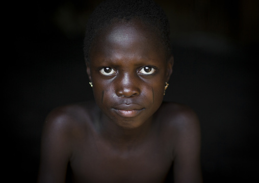 Benin, West Africa, Onigbolo Isaba, holi tribe girl with traditional facial scars