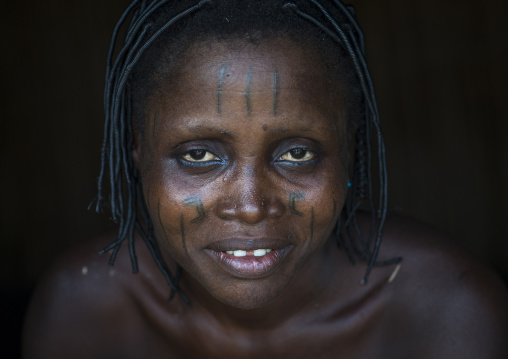 Benin, West Africa, Onigbolo Isaba, holi tribe woman covered with traditional facial tattoos and scars