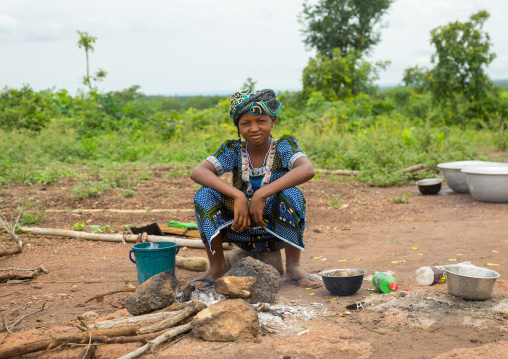 Benin, West Africa, Taneka-Koko, a young fulani peul tribe girl cooking