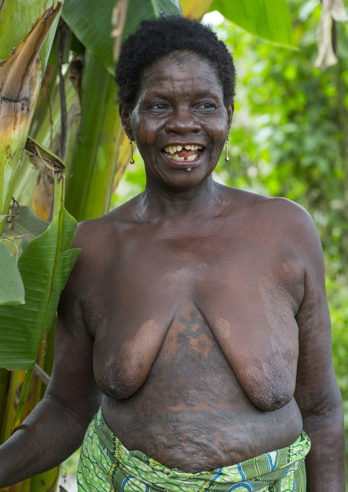 Benin, West Africa, Onigbolo Isaba, holi tribe woman covered with traditional tattoos and scars