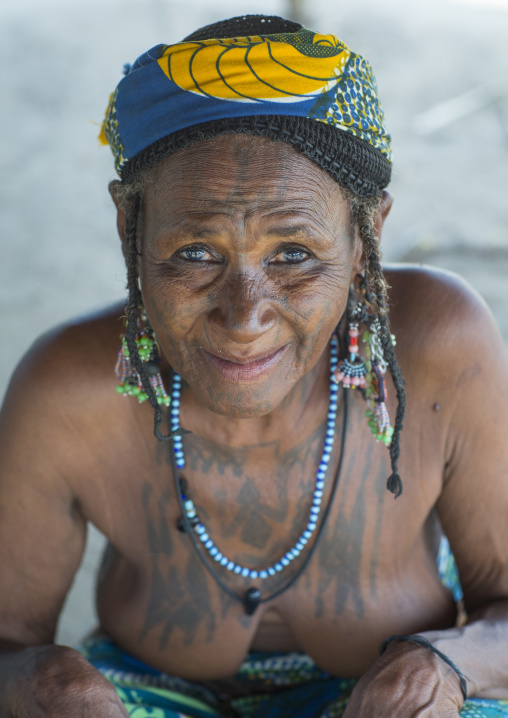 Benin, West Africa, Gossoue, an old tattooed fulani peul tribe woman portrait