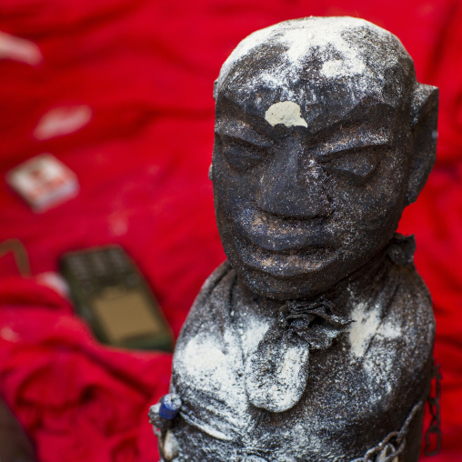 Benin, West Africa, Bonhicon, statue covered with blood during a voodoo ceremony