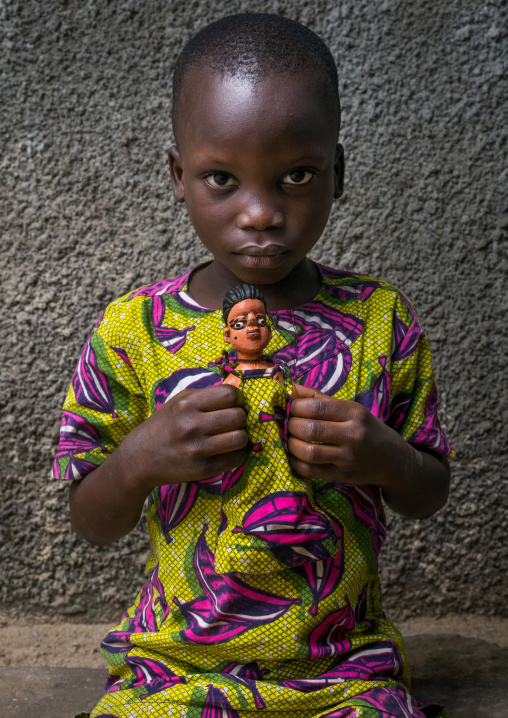 Benin, West Africa, Ouidah, edouard takes cares of the carved wooden figure made to house the soul of his dead sister paterna