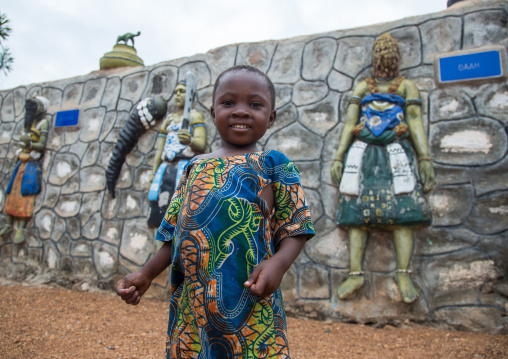 Benin, West Africa, Savalou, little boy in front of sakpata king palace