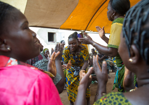 Benin, West Africa, Savalou, women dancing for a celebration