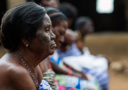 Benin, West Africa, Bopa, woman with tattooed face during a voodoo ceremony