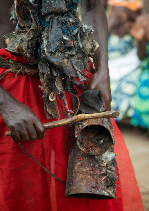 Benin, West Africa, Bopa, man with a bell during a voodoo ceremony