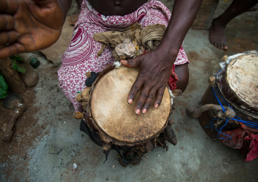 Benin, West Africa, Bopa, drummer playing during a voodoo ceremony