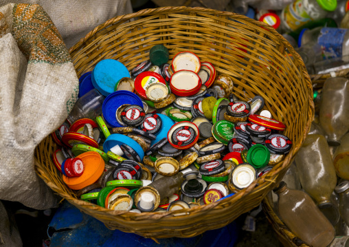 Benin, West Africa, Cotonou, bottles caps gathered for recycling in dantokpa market