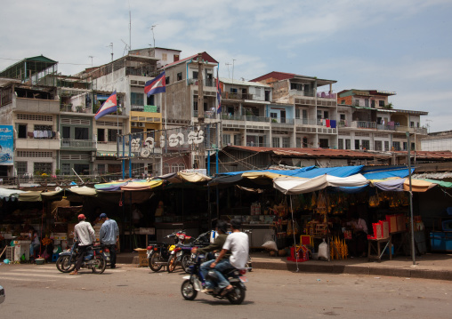 Market stalls in front of old colonial buildings, Phnom Penh province, Phnom Penh, Cambodia