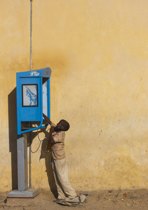 Child Using A Public Phone, Anseba, Keren, Eritrea