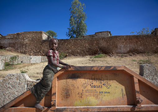Portrait Of A Kid In Front Of The Harar Old Walls, Ethiopia