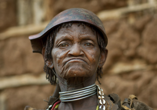 Portrait Of Senior Banna Tribe Woman With Calabash On Head In Key Afer, Omo Valley, Ethiopia
