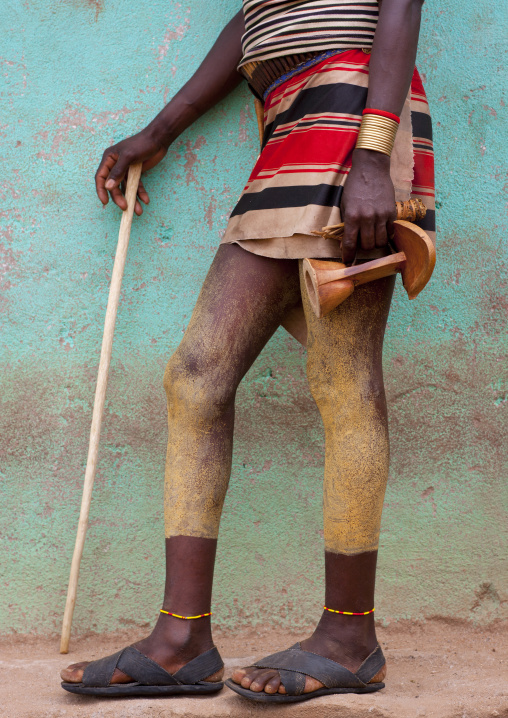 Legs Of Hamer Spread With Clay, Carrying Wood Stick And Headrest Omo Valley Ethiopia