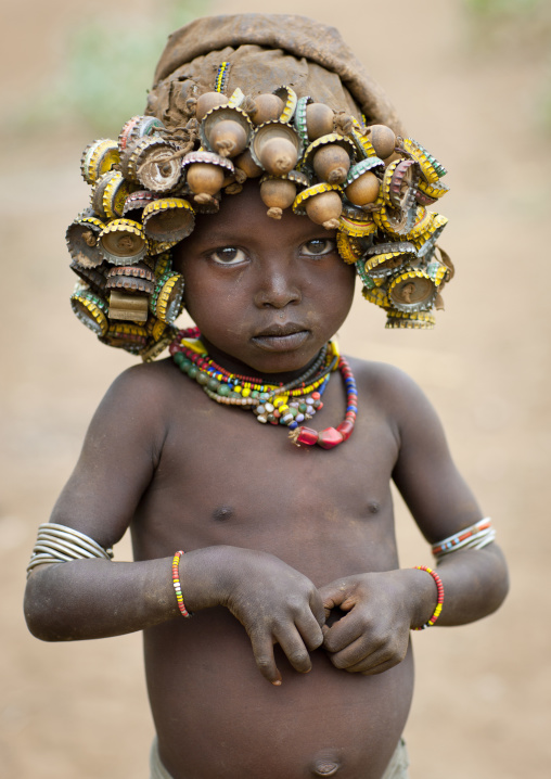 Dassanech Baby Boy Portrait Wearing Bottle Cap  Omo Valley Ethiopia