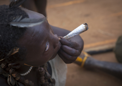 Majang Tribe Man Smoking For A Celebration, Kobown, Ethiopia