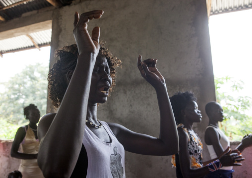 Woman Praying During Catholic Sunday Church Service, Gambela, Ethiopia