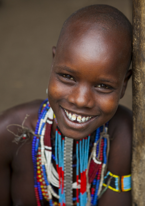 Portrait Of Beautiful Erbore Tribe Woman Wearing Beaded Necklace,  Omo Valley, Ethiopia