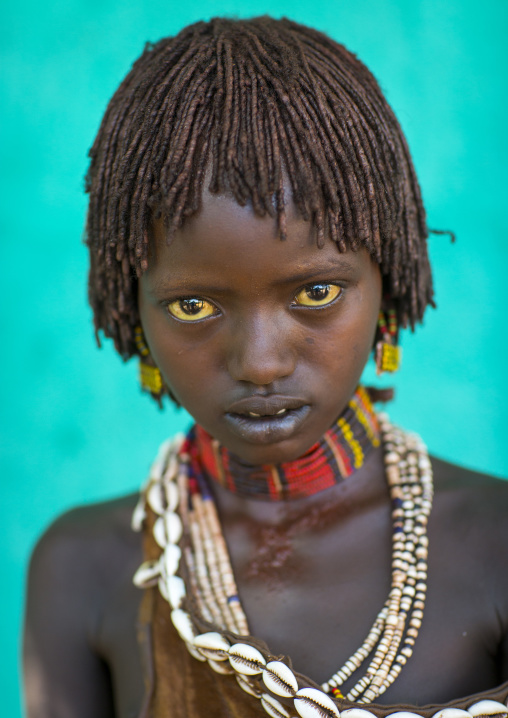 Litte Hamer Girl Tribe In Traditional Outfit, Turmi, Omo Valley, Ethiopia