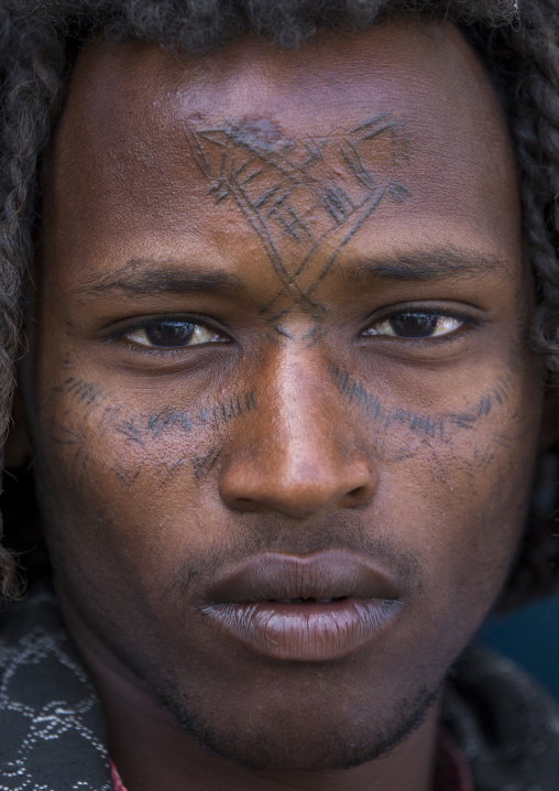 Afar Tribe Man With Curly Hair And Facial Tattoos, Assayta, Ethiopia