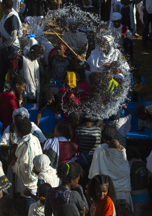 Holy Water Sprayed Onto The Crowd Attending Timkat Celebrations Of Epiphany, Lalibela, Ethiopia