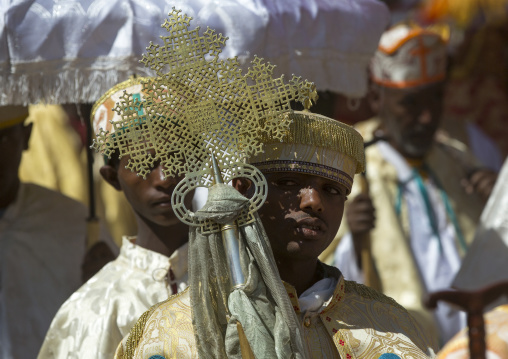 Ethiopian Orthodox Priest Holding A Cross During The Colorful Timkat Epiphany Festival, Lalibela, Ethiopia