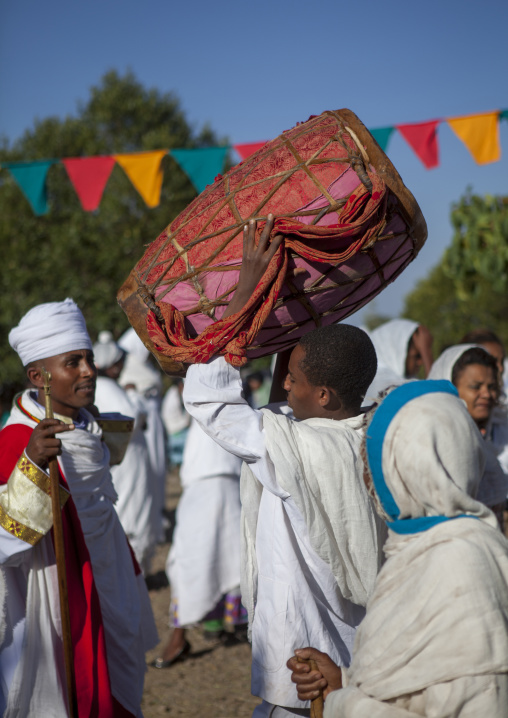 Orthodox Pilgrim Holding A Drum At Timkat Festival, Lalibela, Ethiopia