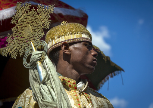 Ethiopian Orthodox Priest Holding A Cross During The Colorful Timkat Epiphany Festival, Lalibela, Ethiopia