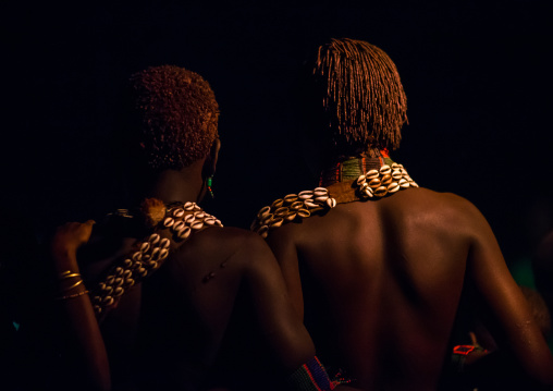 Hamer tribe teenage girls dancing at night, Omo valley, Turmi, Ethiopia