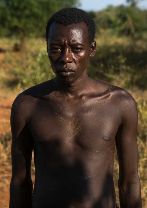 Hamer tribe man jumper a bull jumping ceremony, Omo valley, Turmi, Ethiopia