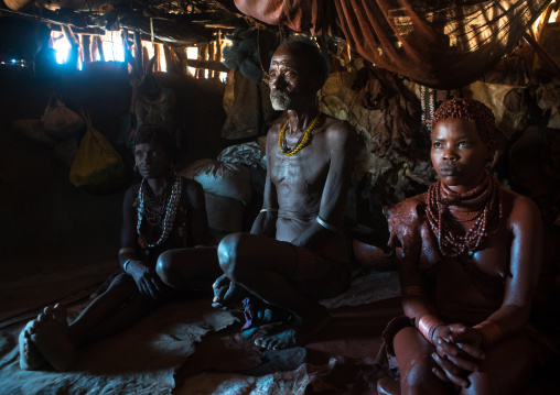Hamer tribe teenage girl called a uta and her future stepfather who keeps her 6 months in a hut, Omo valley, Turmi, Ethiopia