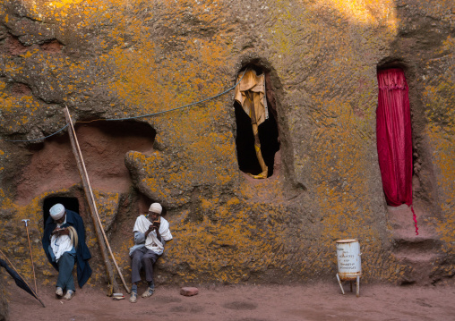 Ethiopian priests in a rock church during kidane mehret orthodox celebration, Amhara region, Lalibela, Ethiopia