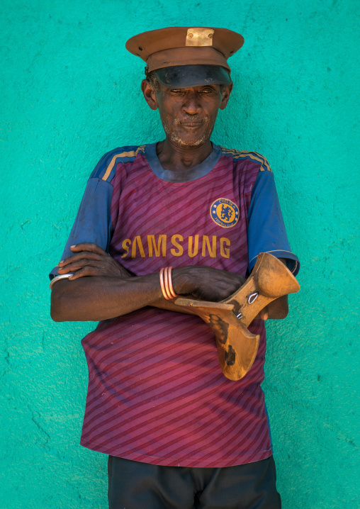 Portrait of a hamer tribe old man with chelsea football shirt, Omo valley, Turmi, Ethiopia