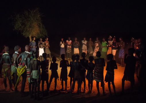 Hamer tribe people dancing at night, Omo valley, Turmi, Ethiopia