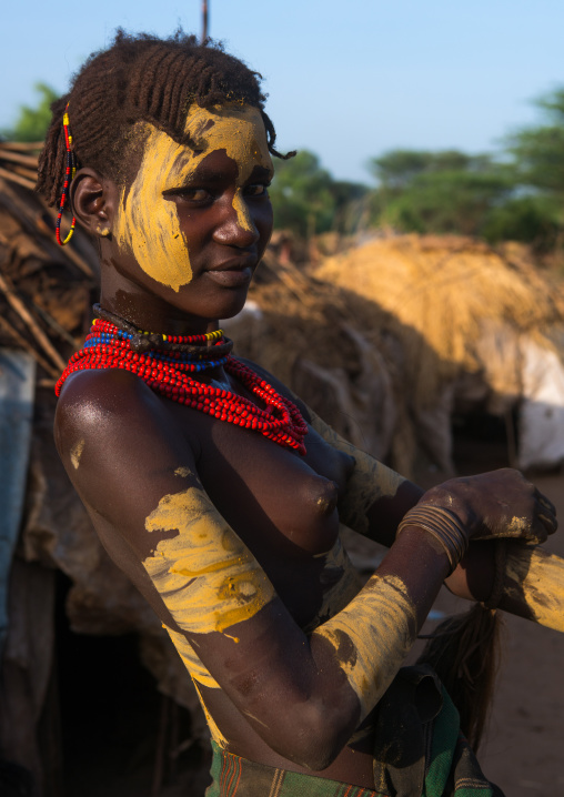 Dassanech tribe teenage girl during dimi ceremony to celebrate circumcision of teenagers, Omo valley, Omorate, Ethiopia