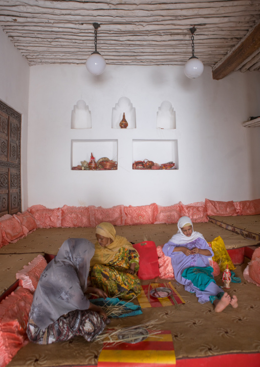Women inside an harari house, Harari region, Harar, Ethiopia