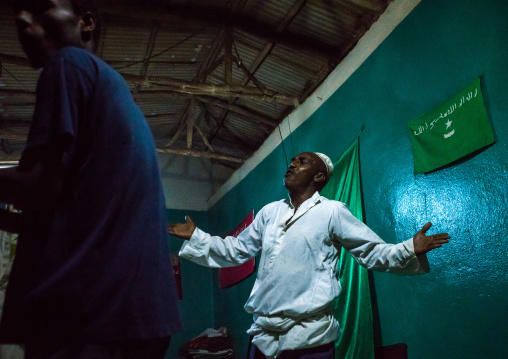 Sufi people go into a trance during a ceremony, Harari region, Harar, Ethiopia