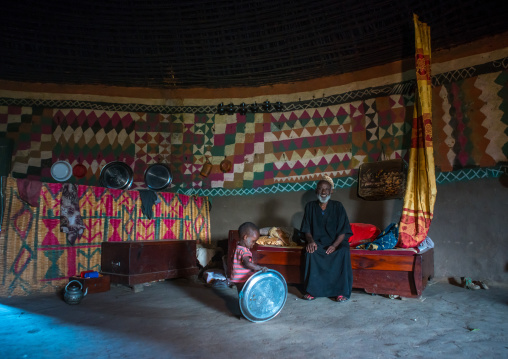 Ethiopia, Kembata, Alaba Kuito, ethiopian muslim man inside his traditional painted and decorated house